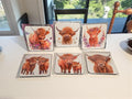 Hand printed, highland cow, cork-backed, wipeable coasters.